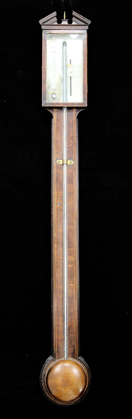 J. Pioty of Lincoln. A George III inlaid mahogany stick barometer, 3ft 1in.
